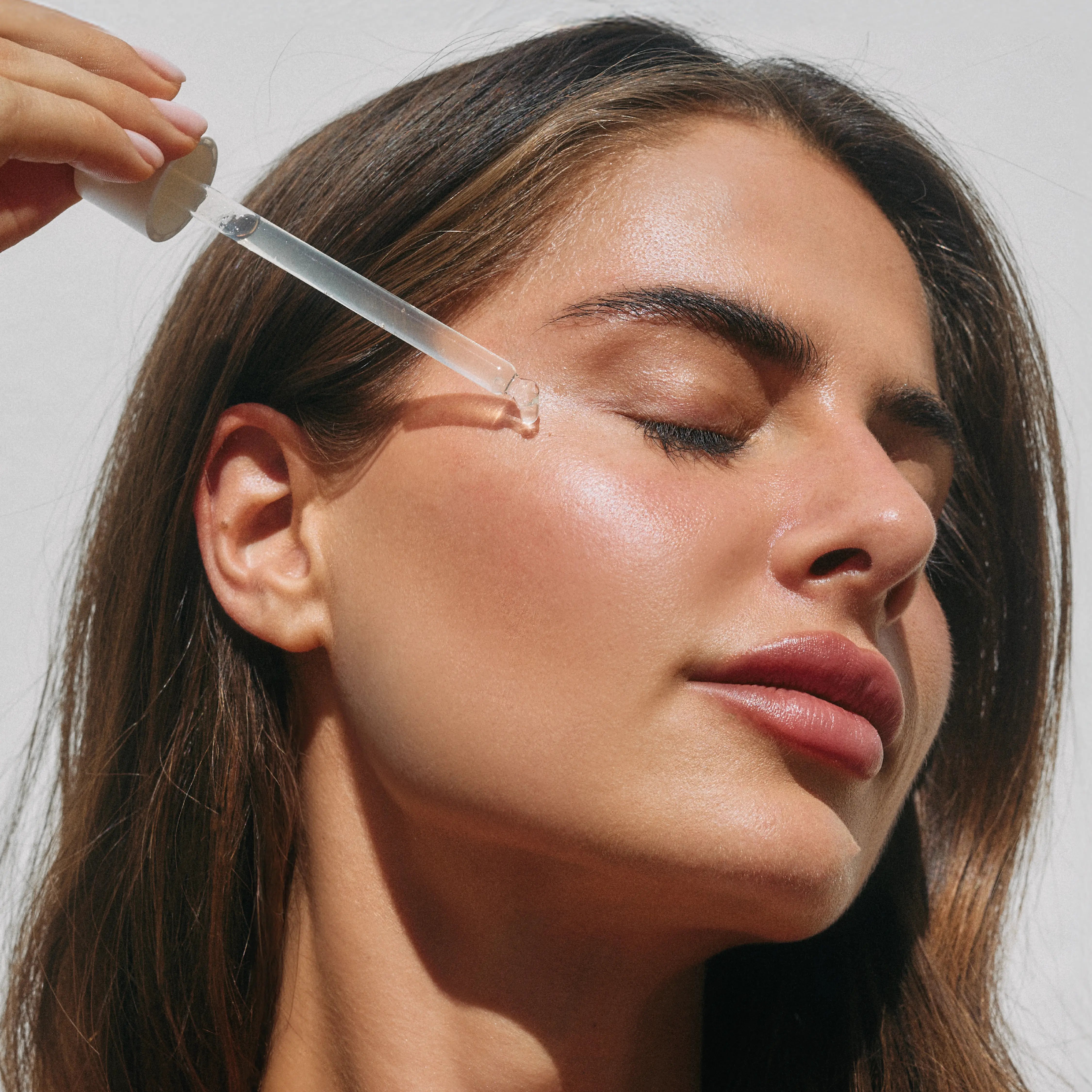 Hyaluronic acid tanning drops